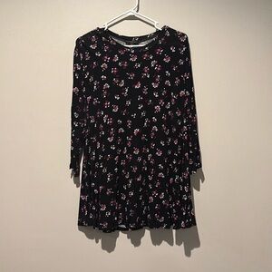 Black with pink, purple, and white floral design tunic